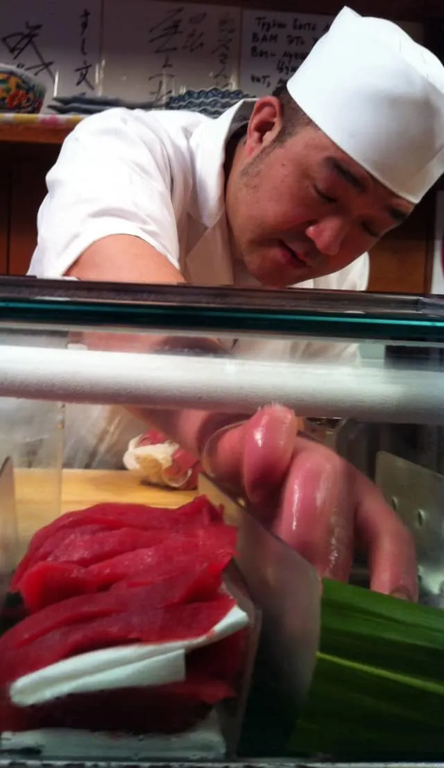 Sushi Bun Chef at Tsukiji Market in Tokyo Japan