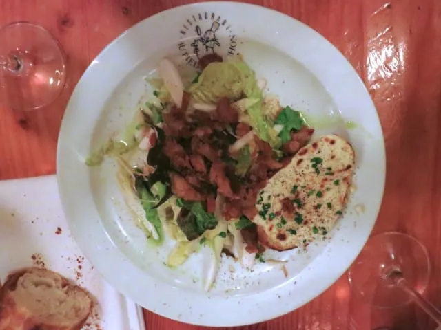 Special Salad with Crispy Lardons at Au Pied de Cochon in Montreal Canada