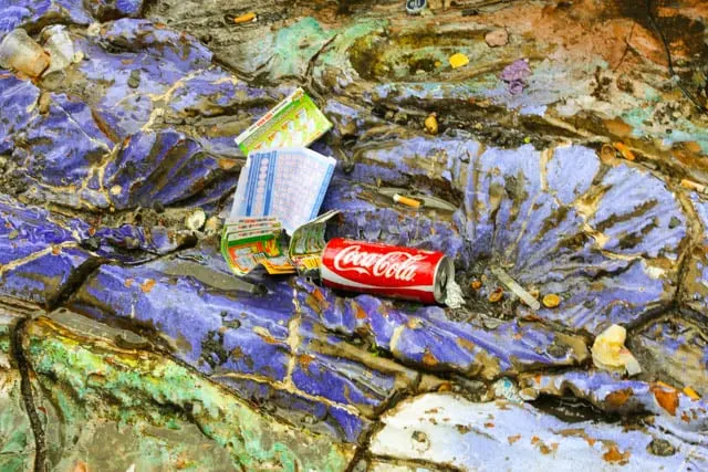 Colorful Litter in Naples - Coca Cola Can and Lottery Tickets Nestled in a Public Sculpture Naples Italy Real Italian City