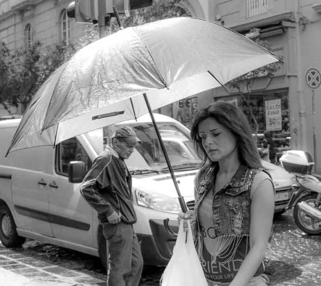 Woman with Umbrella in Naples Italy