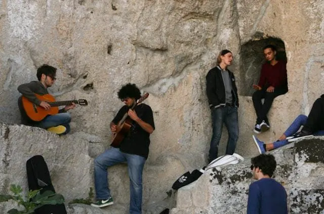 Rock Band Playing in the Rocks in Matera Italy