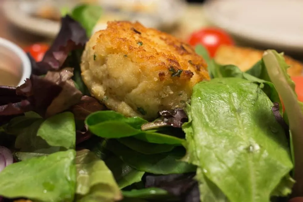 Salad with Pan-Seared Crab Cakes at Union Oyster House in Boston Massachusetts 