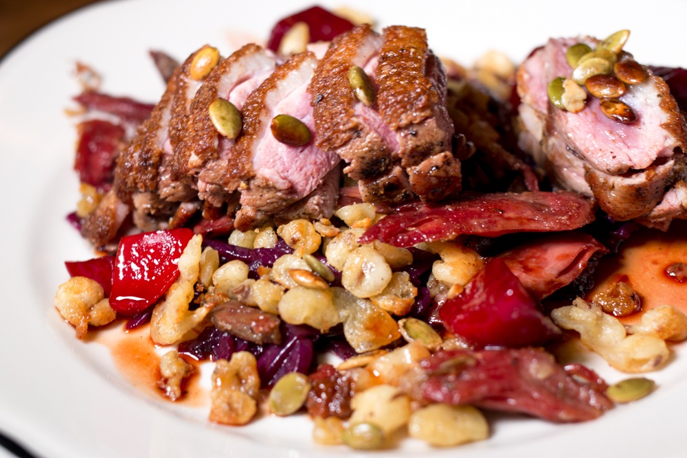 The Roasted Duck Breast is served with duck confit, spaetzle, honey beets, sweet and sour cabbage and pepitas. These flavors combine to create a new Pittsburgh classic.