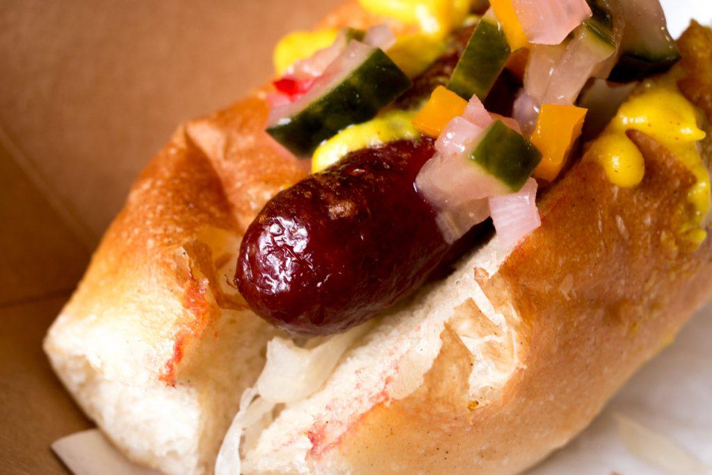 Frenchie To Go Hot Dog with Yellow Mustard and Homemade Relish in Paris France