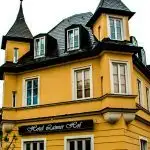 Pinterest image: image of hotel with caption ‘Hotel Laimer Hof Munich’