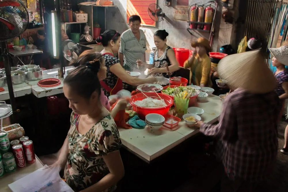 Family Food Stand at the Dong Ba Market in Hue Vietnam