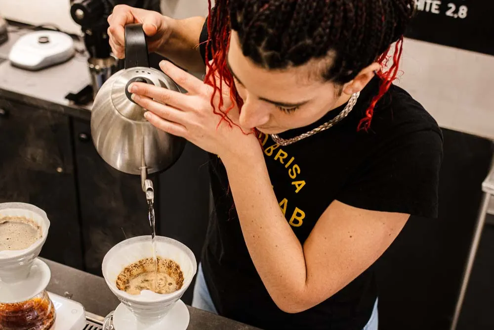 Clementina Verrocchio prepares coffee at Forno Brisa San Felice in Bologna Italy