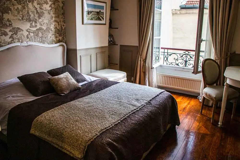 Bedroom in Cobblestone Paris Apartment Hotel
