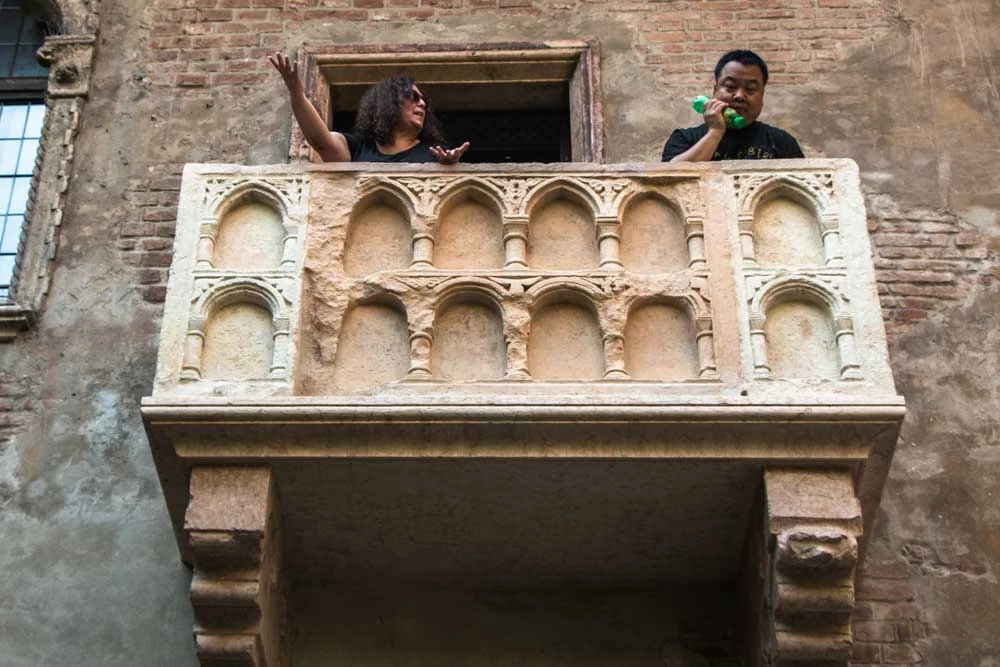 Mindi and Asian Man on Juliets Balcony in Verona Italy