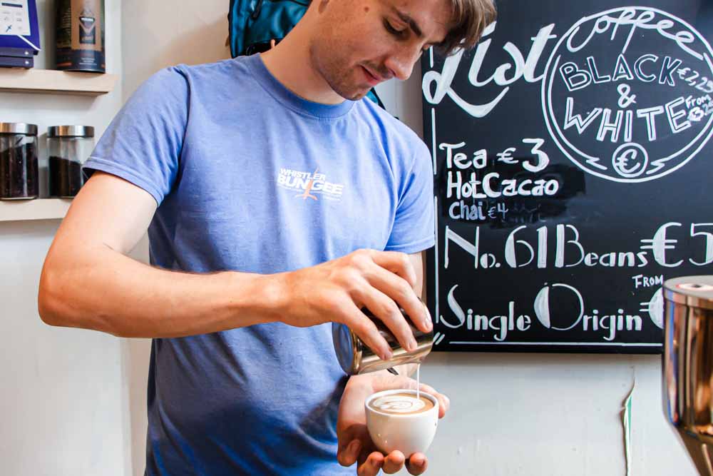 Barista at Lot Sixty One Coffee Roasters at Urban Outfitters in Amsterdam