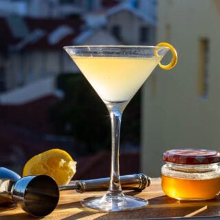 Bees Knees Cocktail with Ingredients on Window Sill