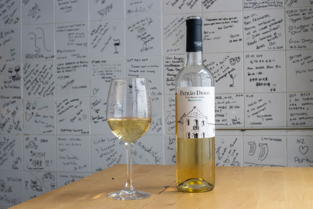 White Wine Bottle and Wine Glass at Botica Saloia in Sintra 