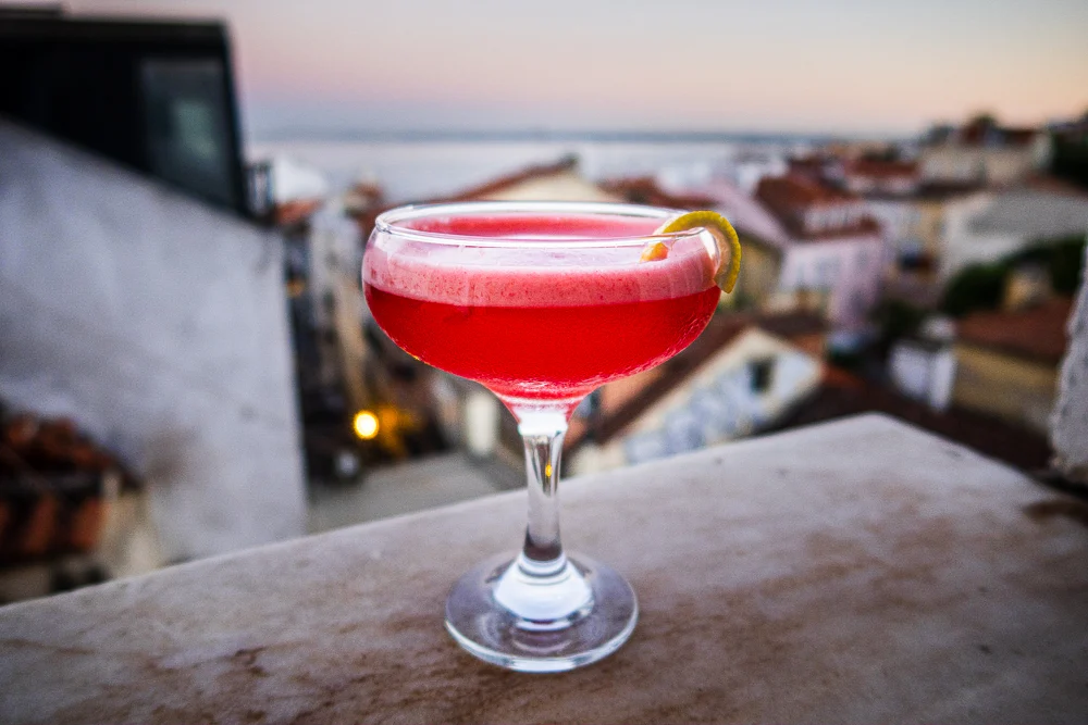 Clover Club Cocktail on Ledge at Night