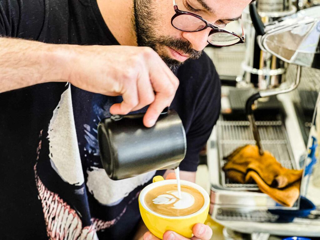 Barista at How About Coffee in Lisbon