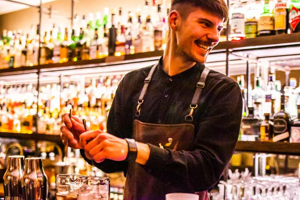 Bartender at The Whisky Shop and Bar by Duokle Angelams in Vilnius