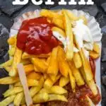 Pinterest image: image of Berlin currywurst with caption reading 'What to Eat in Berlin'
