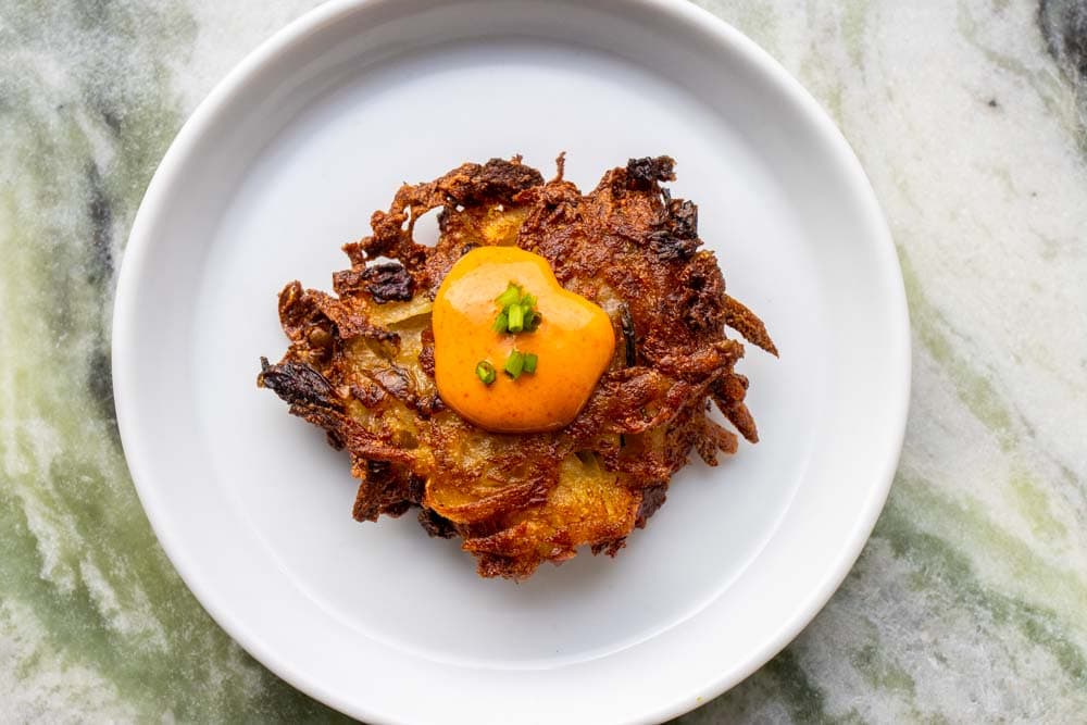 Kimchi Latke with Gochujang Sour Cream with Marble Background