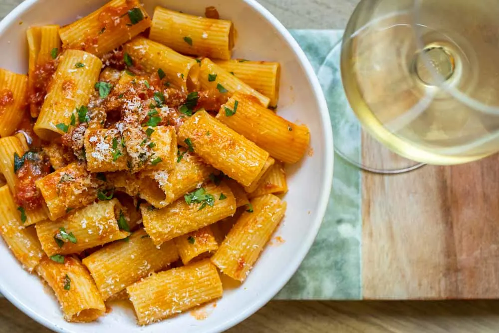Rigatoni Amatriciana with White Wine on Green Marble