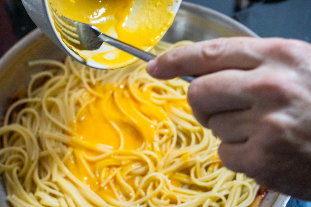Mixing Eggs with Pasta for Carbonara