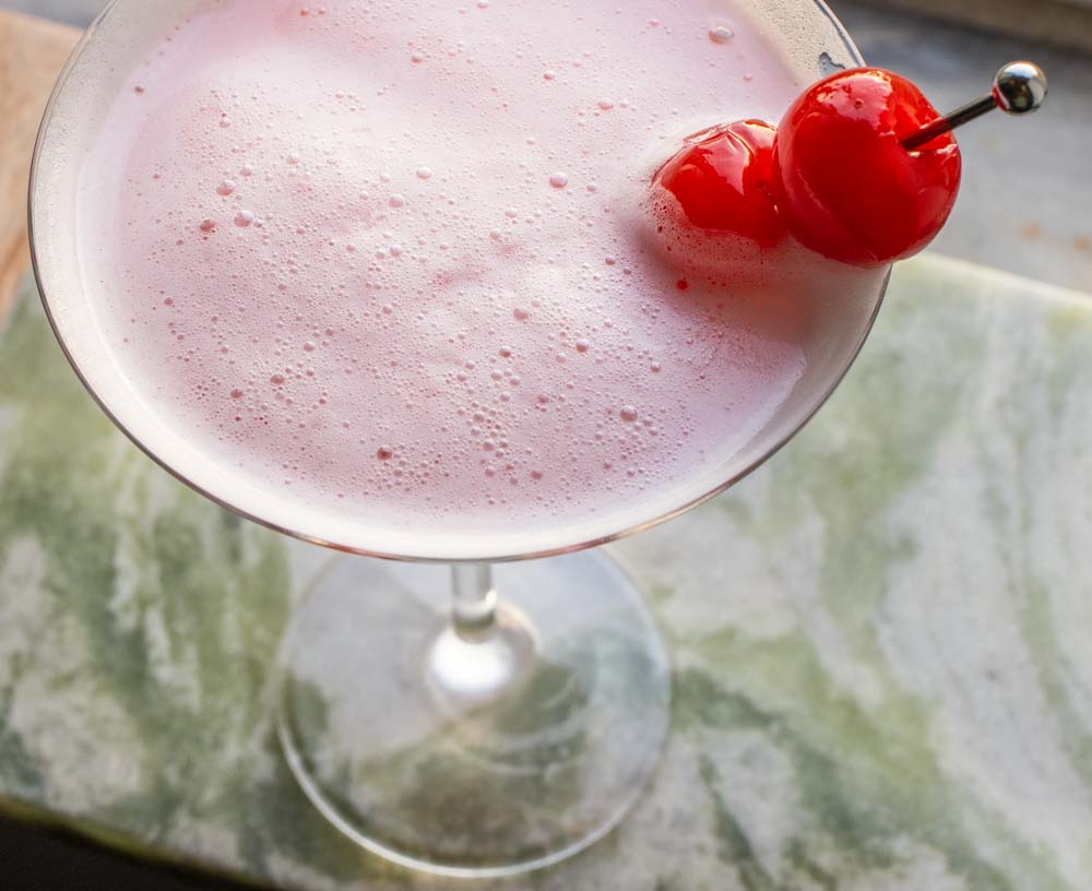 Pink Lady Cocktail with Cherries
