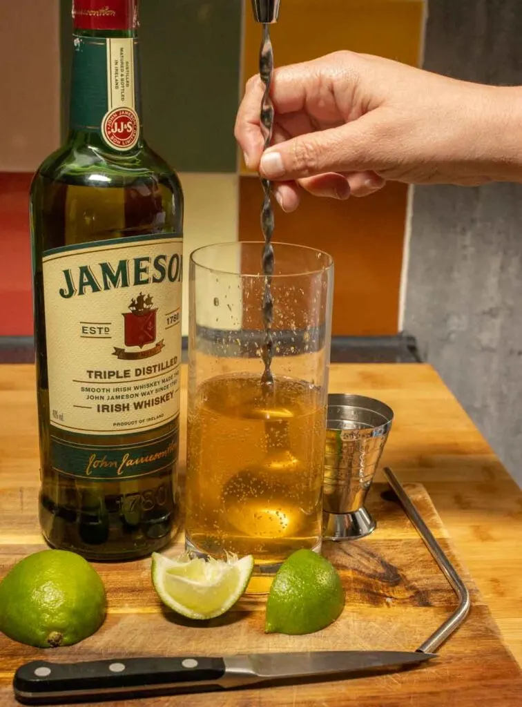 Stirring a Jameson Whiskey Ginger