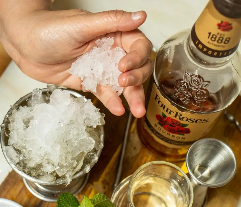 Adding Ice to a Mint Julep