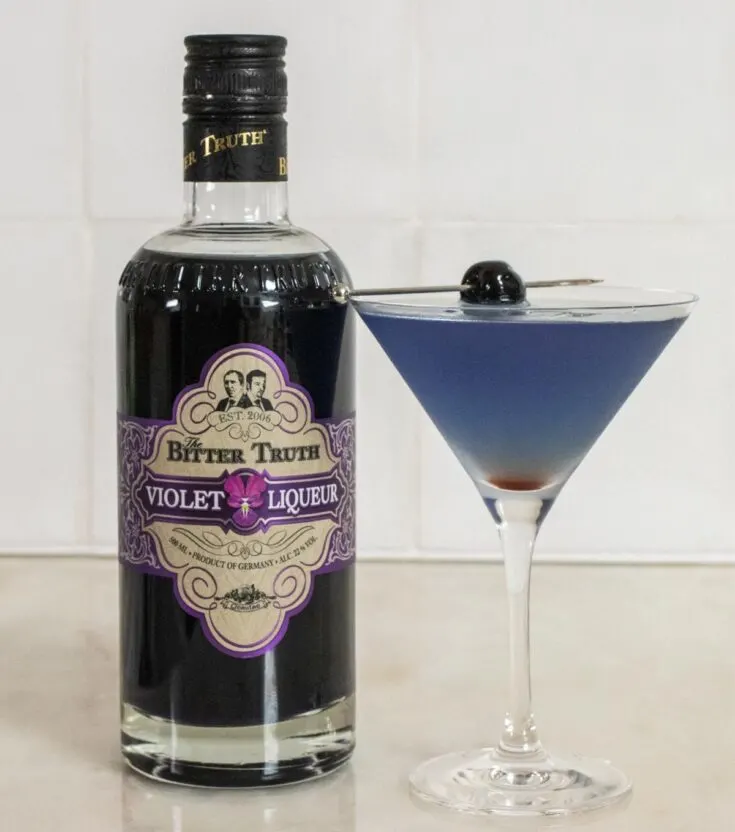 Aviation Cocktail Next to Creme de Violette Bottle