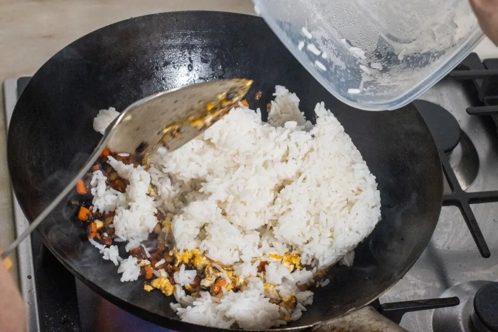 Adding Rice to Yangzhou Rice