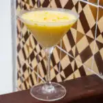 Orange Creamsicle Cocktail Next to Brown Tiles