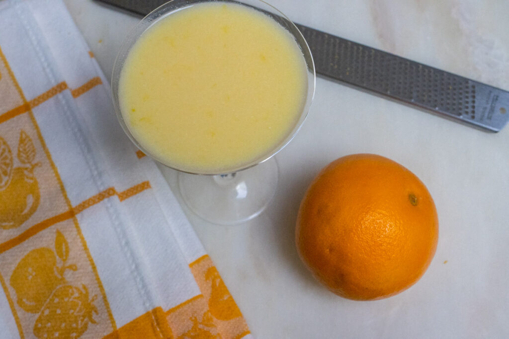 Orange Creamsicle Cocktail with Napkin and Orange