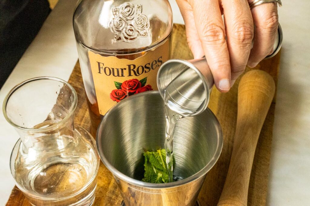 Pouring Simple Syrup into a Mint Julep