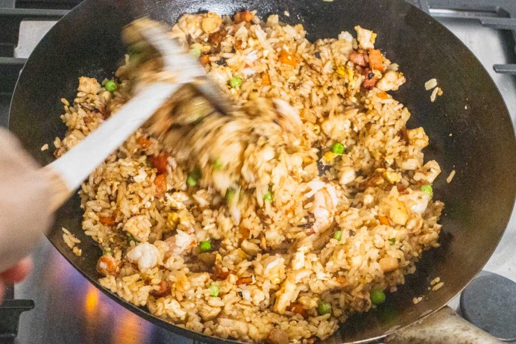 Stirring Yangzhou Rice in Wok