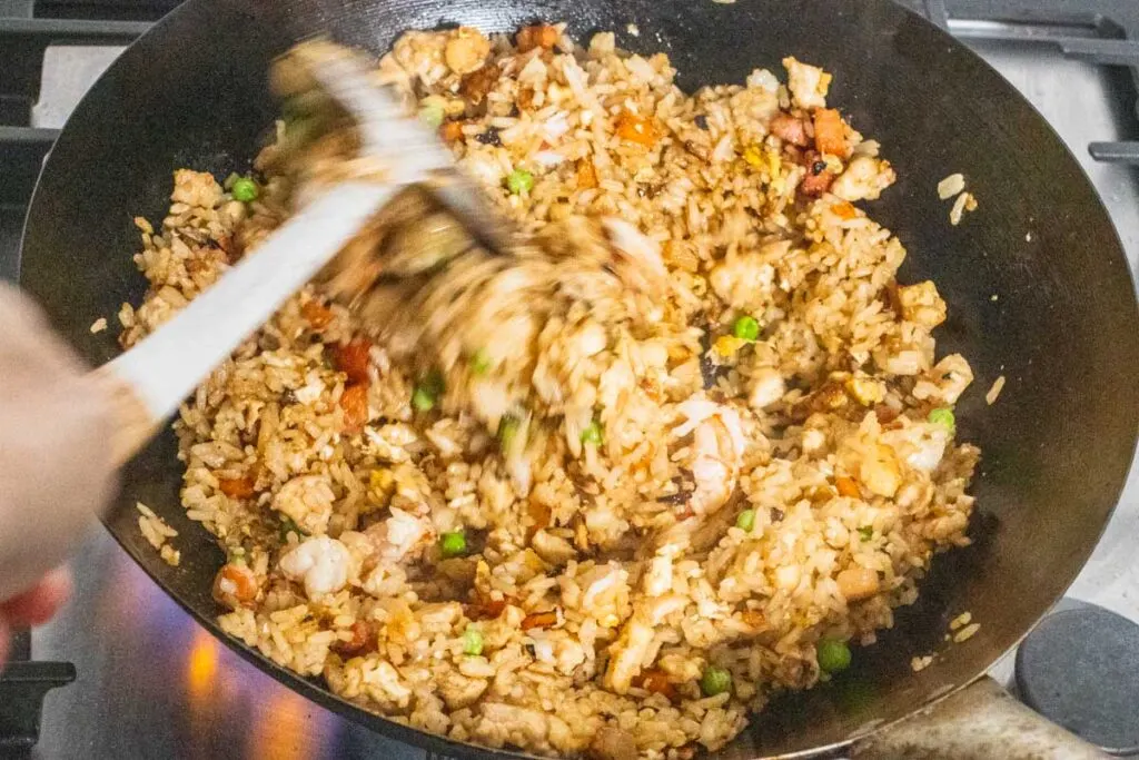 Stirring Yangzhou Rice in Wok