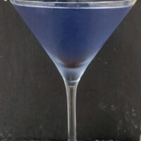 cropped-Aviation-Cocktail-Next-to-Black-Wall.jpg