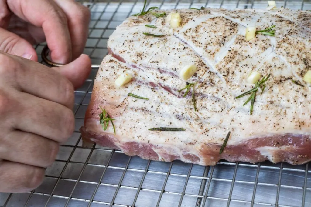 Inserting Oven Probe for Pork Loin Roast