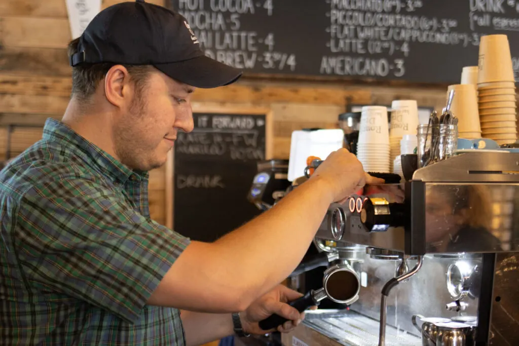 Barista at Rough Draft Bar and Books in Kingston