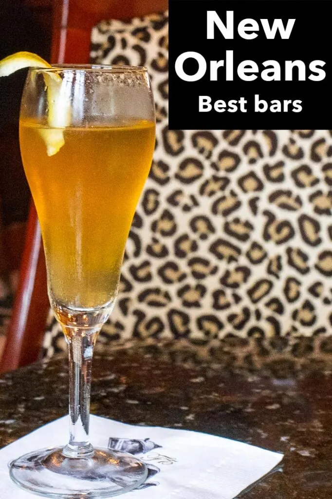 Pinterest image: french 75 cocktail with caption reading "New Orleans Best Bars"