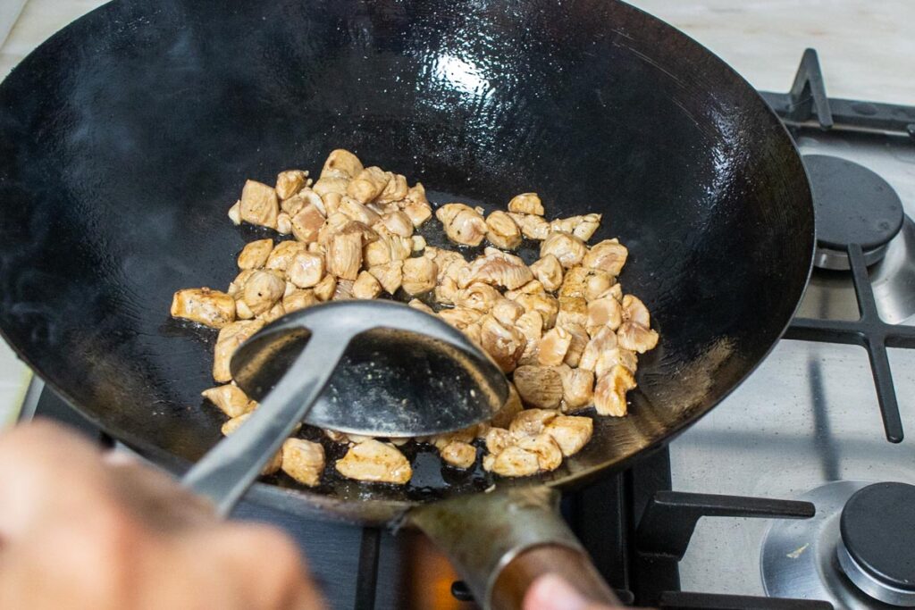 Stir Frying Chicken in Wok