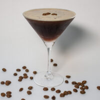 Espresso Martini Surrounded by Beans