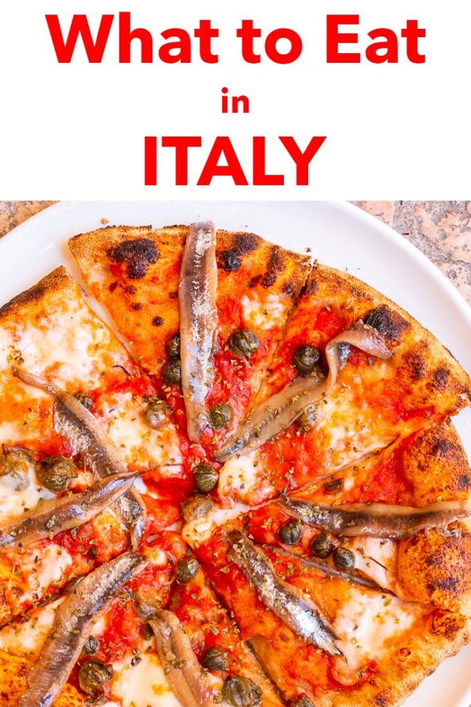 Pinterest image: photo of an Pizza with caption reading "What to Eat in Italy"