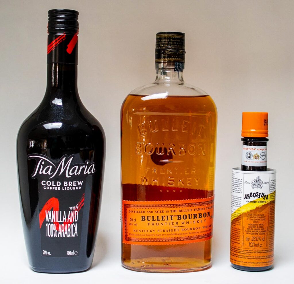 Bottles of Tia Maria, Bulleit Bourbon and Orange Bitters