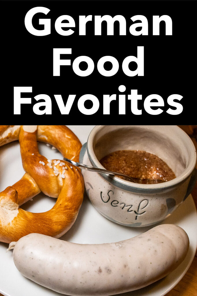 Pinterest image: photo of a pretzel, wurst and mustard on plate with caption reading "German Food Favorites"
