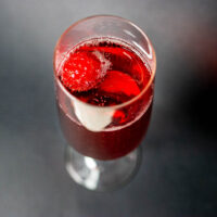 Kir Royale with Raspberry from Above