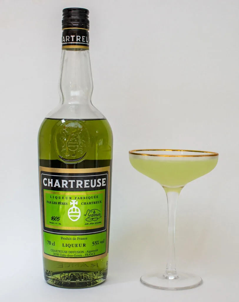 Last Word Cocktail Next to Green Chartreuse Bottle