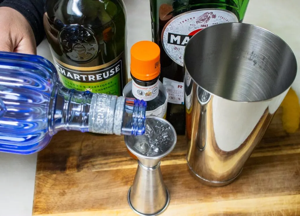 Measuring Gin for Bijou Cocktail Recipe