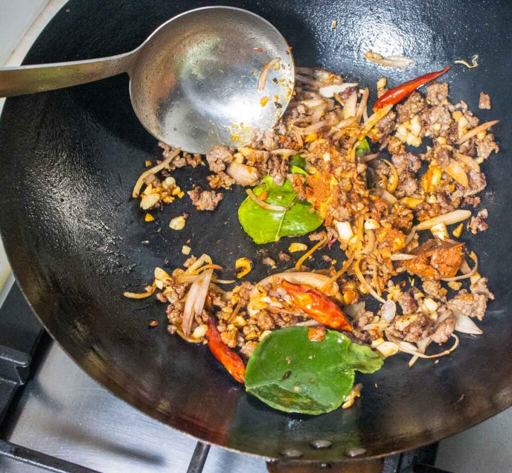 Stirring Thai Penang Curry Noodles Recipe in Wok