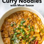 Pinterest image: photo of an Thai Panang Curry with Meat Sauce in White Bowl with caption reading "How to Make Thai Panang Curry Noodles with Meat Sauce"