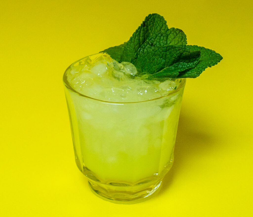 Absinthe Frappe with Yellow Background