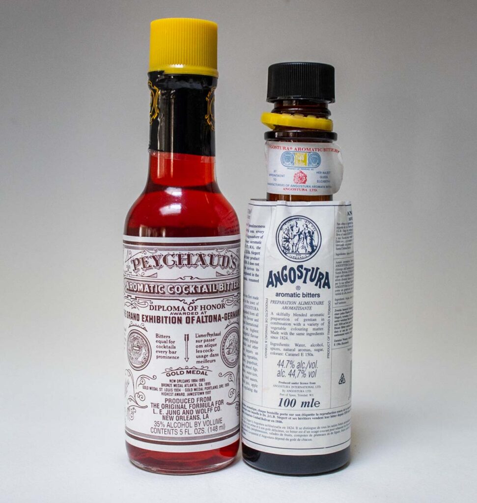 Bottles of Angostura and Peychauds Bitters