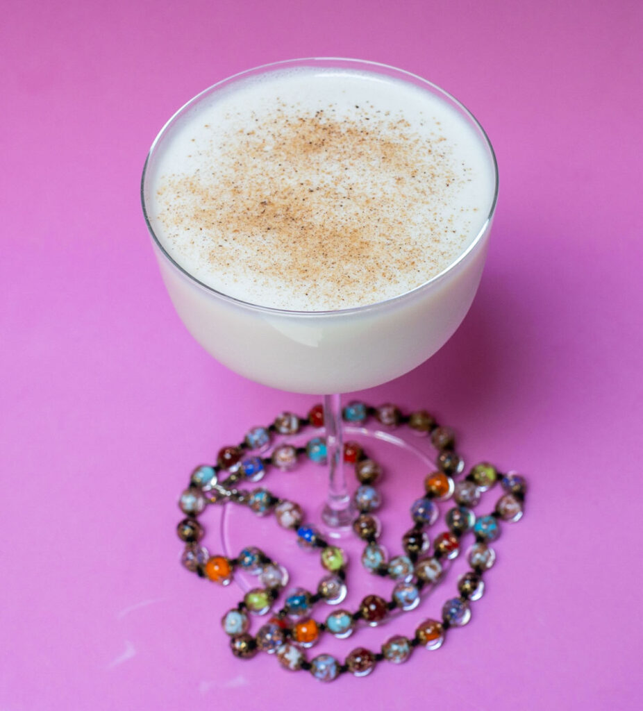 Bourbon Milk Punch with Necklace with Pink Background.jpg